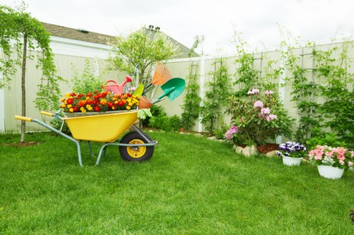 Professional landscape designer planning garden layout in Ickenham